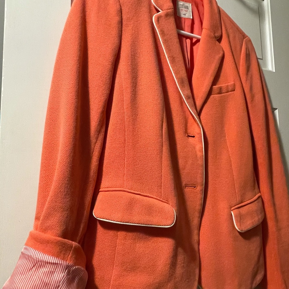 Coral blazer with striped detail inside